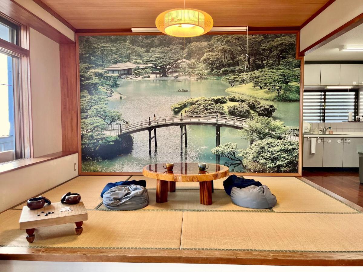 バーベキューもできる! 海と浜比嘉大橋を一望できる宿 Henza Extérieur photo