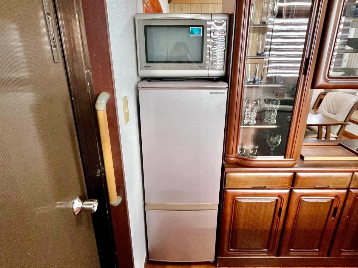 バーベキューもできる! 海と浜比嘉大橋を一望できる宿 Henza Extérieur photo